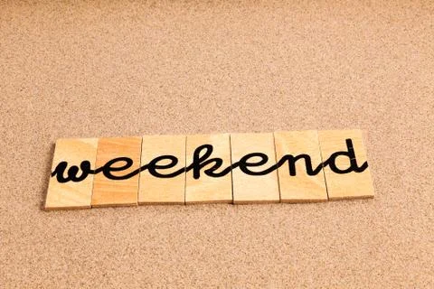 Words on sand Weekend Stock Photos