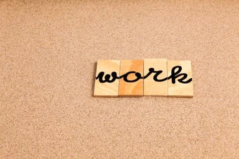 Words on sand Work Stock Photos