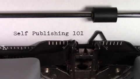 The words "Self Publishing 101" being typed on a typewriter Stockbeeldmateriaal 122891384