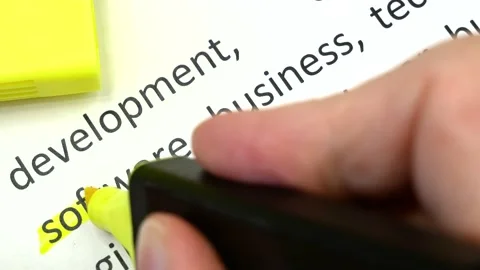 Words software developer underlnines among other words printed on white pap.. Stock Footage 229239034
