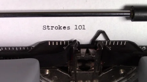 The words "Strokes 101 " being typed on a typewriter Stockbeeldmateriaal 122883057