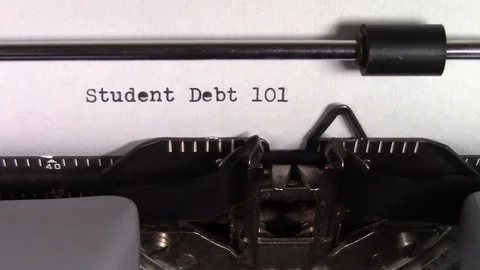 The words "Student Debt 101" being typed on a typewriter Stockbeeldmateriaal 122891755