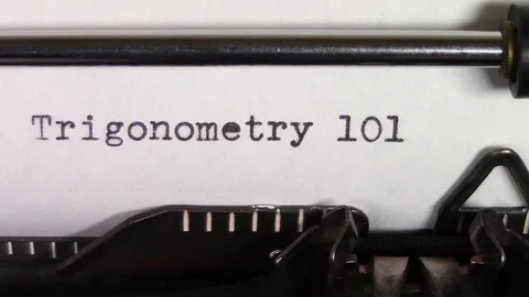 The words "Trigonometry 101 " being typed on a typewriter Stockbeeldmateriaal 122529856