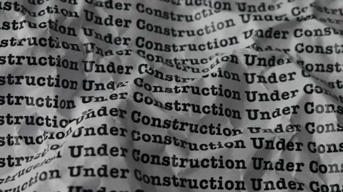 Words Under Construction Seamless print on crumpled paper for business back.. Stock Footage 312495577