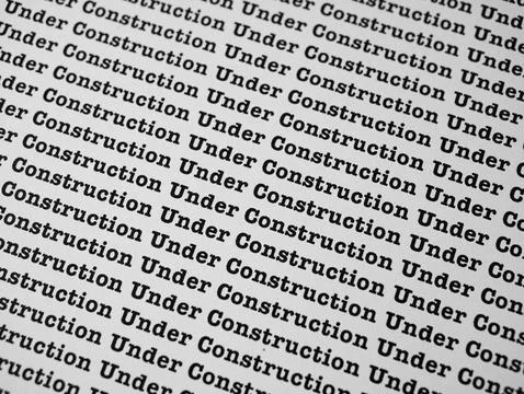 Words Under Construction Seamless print on paper for business background. Foto stock
