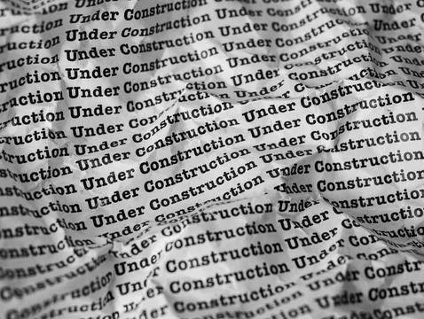 Words Under Construction Seamless print on crumpled paper for business back.. Stock Photos