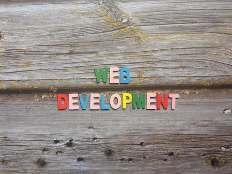 Words Web development on wood background Stock Photos