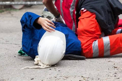 Work accident. First aid. Stock Photos