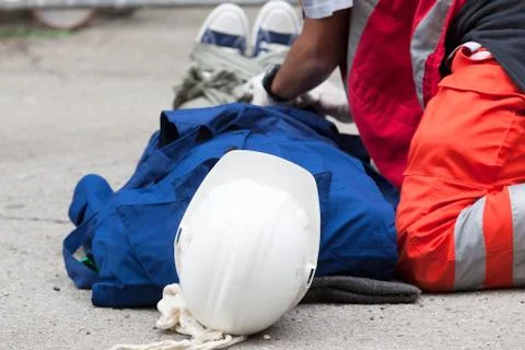 Work accident. First aid. Stock Photos
