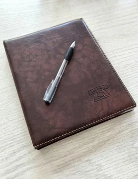 Work and planning concept: notebook and pen 스톡 사진