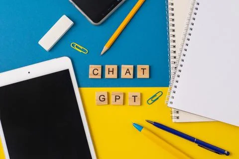 Work and study with the help of a chat bot. Words in wooden letters. Work table Stock Photos