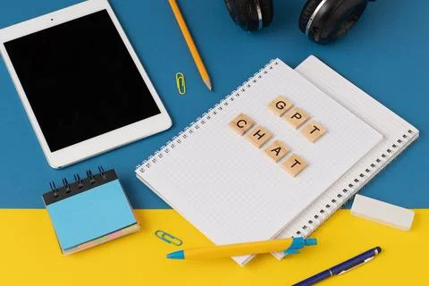 Work and study with the help of a chat bot. Words in wooden letters. Work table Stock Photos