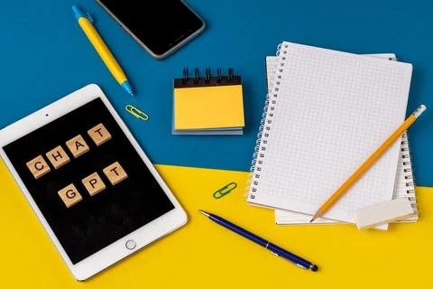 Work and study with the help of a chat bot. Words in wooden letters. Work table Stock Photos