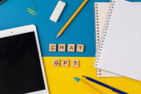 Work and study with the help of a chat bot. Words in wooden letters. Work table Stock Photos