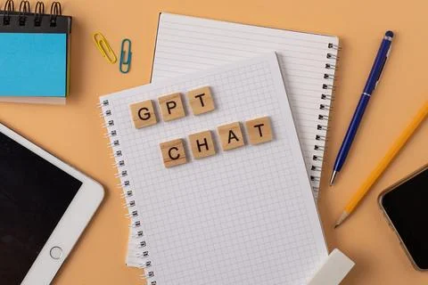 Work and study with the help of a chat bot. Words in wooden letters. Work table Stock Photos