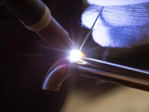 Work with argon welding Stock Photos
