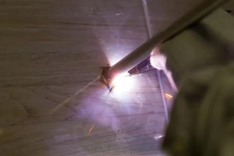 Work with argon welding Stock-Fotos