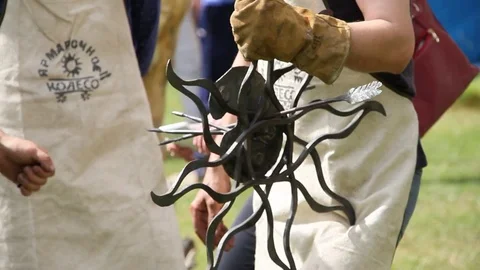A work of art in the hands of a blacksmith. National holiday. Altai. Russia. 스톡 동영상 70669387