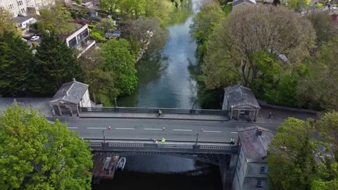 Work begins on an old victorian bridge with high vis workers prepping the Video stock 160562037