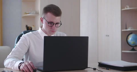 Work behind the laptop at home, remote work Video stock 137746265