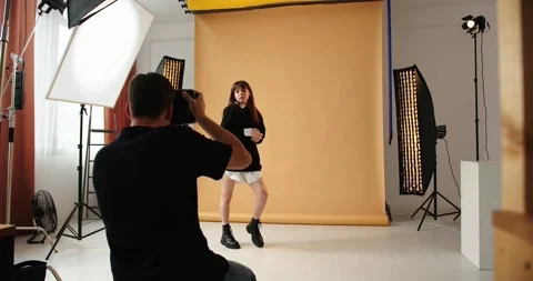 Work behind the scenes of professional photography in the studio. Stock Footage 279914858