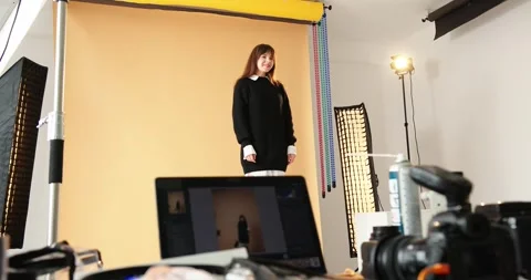 Work behind the scenes of professional photography in the studio. Video stock 279914863