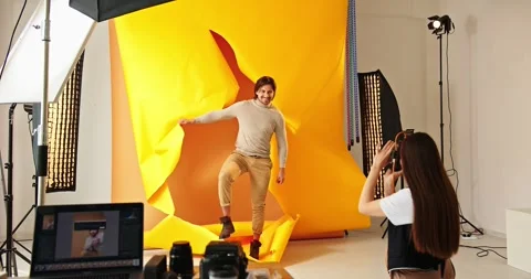 Work behind the scenes of professional photography in the studio. Stock Footage 279915213