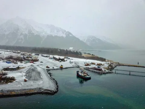 Work boats doing their thing in the waters of Seward Alaska Stock Photos