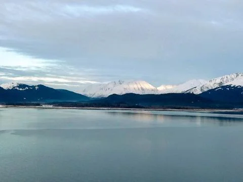 Work boats doing their thing in the waters of Seward Alaska Stock Photos