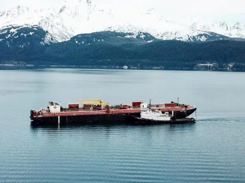 Work boats doing their thing in the waters of Seward Alaska Stock Photos