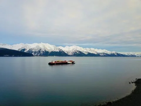 Work boats doing their thing in the waters of Seward Alaska Stock Photos