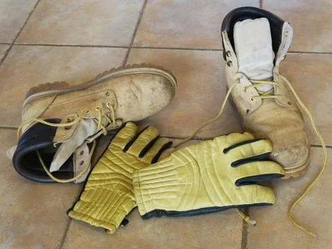 Work boots and gloves Stock Photos