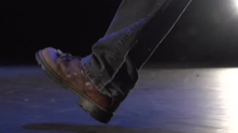 Work boots walking across stage Stock Footage 33890151