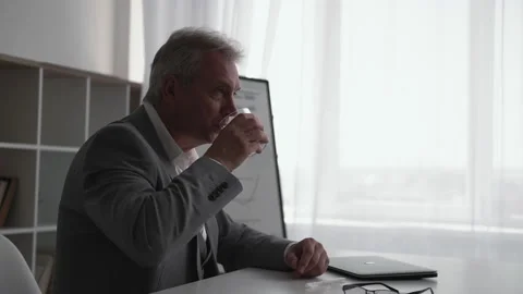Work break office rest business man drinking water Stock Footage 231056999