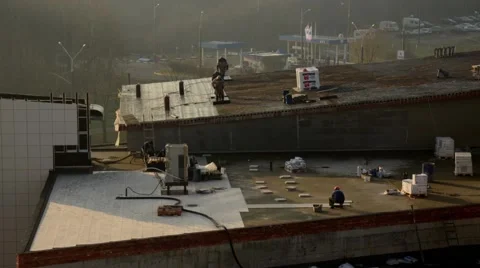 The work of builders. Laying tiles and roofing. Time lapse Stock Footage 44057202