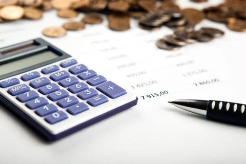 Work on the calculator and papers Stock Photos