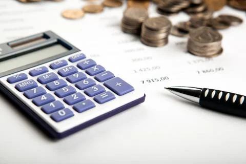 Work on the calculator and papers Stock Photos
