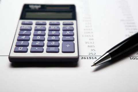Work on the calculator and papers Stock Photos