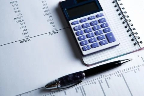 Work on the calculator and papers Stock Photos