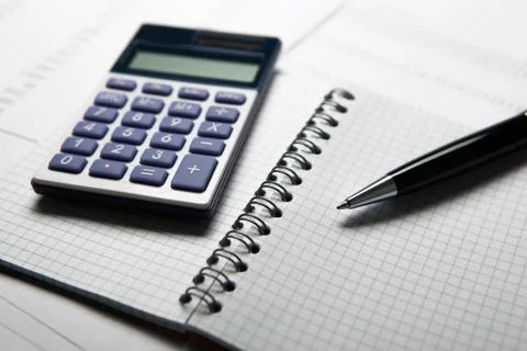 Work on the calculator and papers Stock Photos