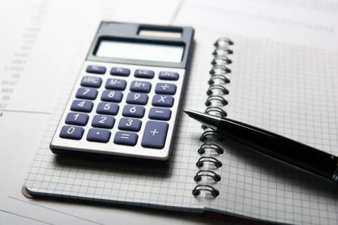 Work on the calculator and papers Foto stock