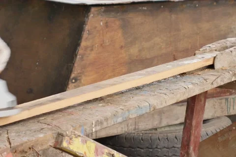 Work carpenter in the workshop. Electric Planer. Stock Footage 65007989