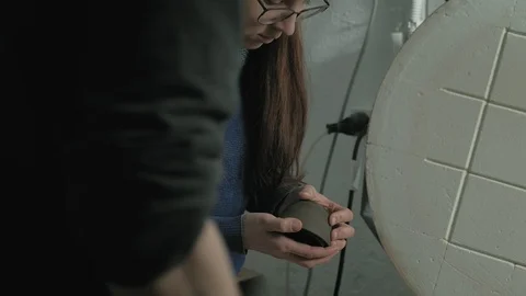 Work of ceramists in the workshop Stock Footage 128024240