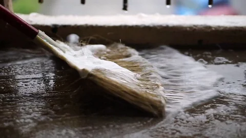 Work cleaning the floor of the corridor in the apartment using chemical soap Stock Footage 128219712