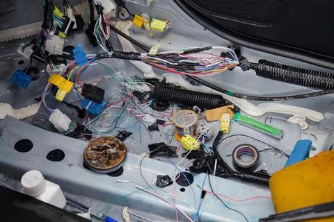 Work clutter of an auto electrician worked in wire replacement and soldering Stock Photos