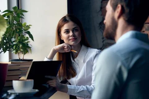 Work colleagues office communication technology professionals lifestyle Stock Photos