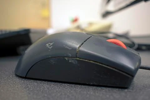 Work colleges filthy computer mouse, close up Stock Photos