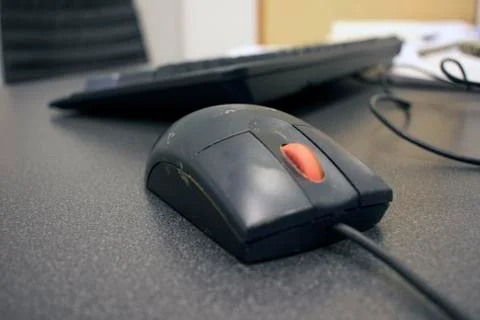 Work colleges filthy computer mouse, close up Stock Photos