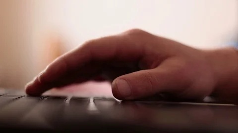 Work at the computer, the guy is typing on the keyboard Stock Footage 120796818