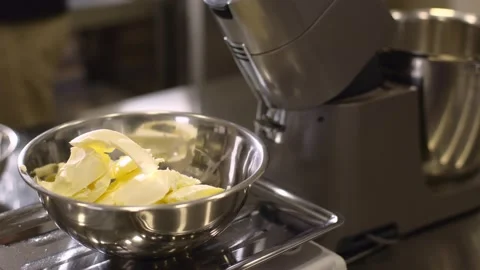 Work of a confectioner. Baking macarons. Dough butter close-up. Baking cookies a Stock-Footage 233294833